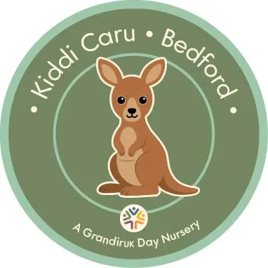Kiddi Caru Bedford, a GrandirUK Day Nursery logo