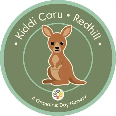 Kiddi Caru Redhill, a GrandirUK Day Nursery logo